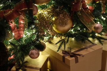close up christmas gifts below christmas tree
