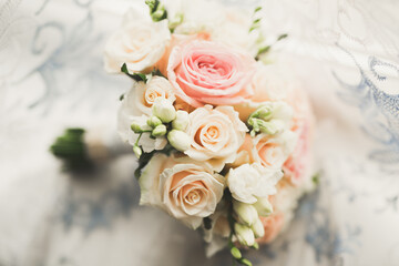 Beautiful wedding bouquet with different flowers, roses