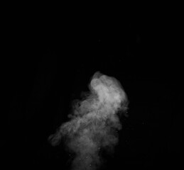 White smoke on black background. Figured smoke on a dark background. Abstract background, design element