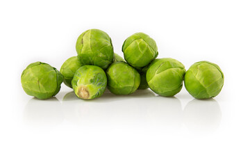 Brussels sprout isolated on white background. Still-life picture of green cabbages taken in studio with soft-box.