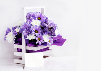 Basket with a bouquet of flowers and the inscription thank you .Blank card with a basket of flowers. greeting card.