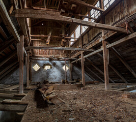 Old abandoned water mill in the forest. Abandoned building..