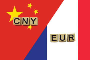 China and France currencies codes on national flags background