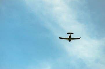 Aerobatic plane flying high in the sky