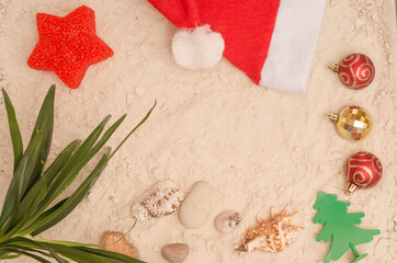 Christmas Background on the sand for travel agencies with copy space.