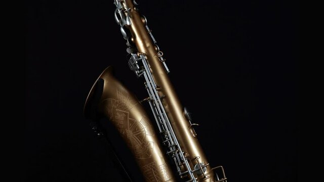 Rotating Saxophone On A Black Background.