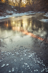 winter landscape on a frozen river in severe frost