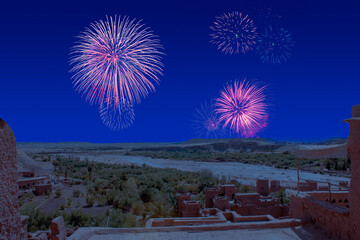 Celebratory fireworks for new year over Kasbah Ait Ben Haddou on the Atlas mountain of Morocco....