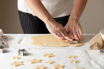 hands kneading dough