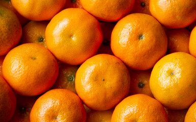 Top view of oranges in basket in supermarket.