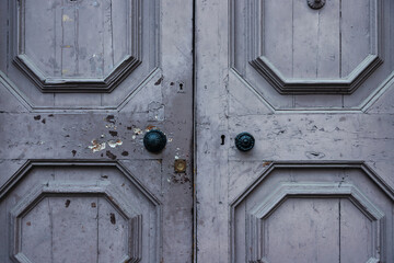 Old vintage door as seen from outside, purple door