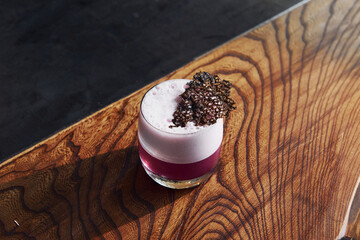 Delicious drink. Close up view of fresh summer cocktail on the wooden table