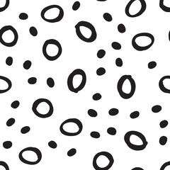 Doodle dots seamless pattern. Hand drawn circles background. Monochrome texture.