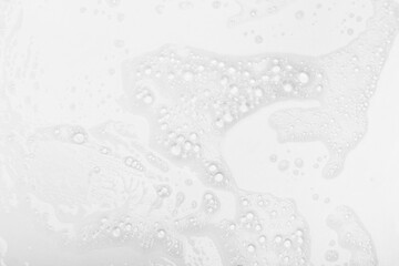 Foam bubble from soap or shampoo for washing isolated on white background from above