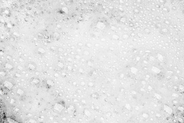 Foam bubble from soap or shampoo for washing isolated on white background from above