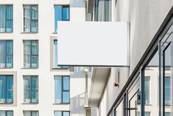 Blank hanging business wall sign, modern style outdoor signage with copy space to add company logo or text