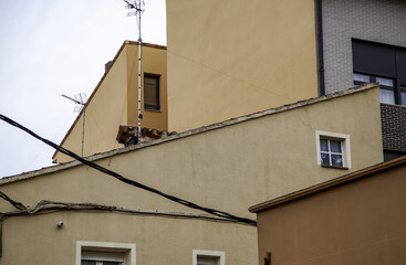 Fototapeta na wymiar Village house with antennas