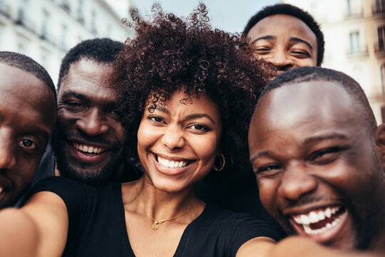 Group of black race friends taking a selfie