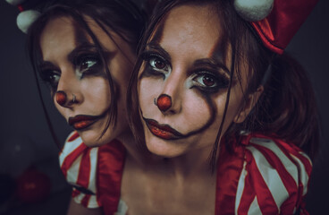 
from the circus of strangers the clown woman with two heads