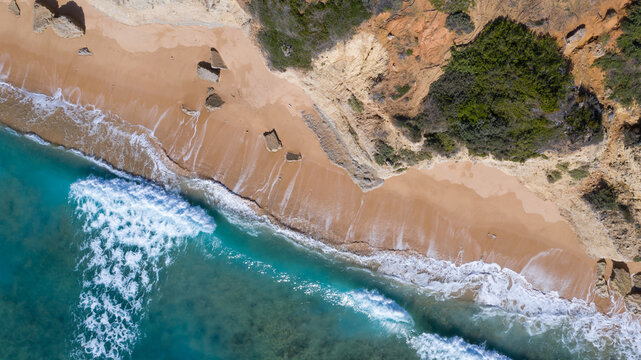 Aerial perspectives of a south Spanish beach in Andalusia with turquoise blue water. Andalusian Atlantic beach background. Ocean in Ca&ntilde;os de Meca, C&aacute;diz, Andalusia, Spain.