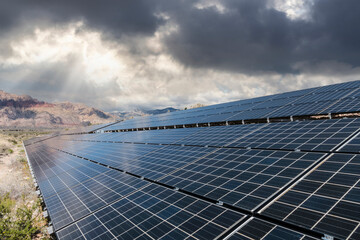 Solar panels with Mojave desert storm clouds at Red Rock Canyon National Conservation Area near Las...