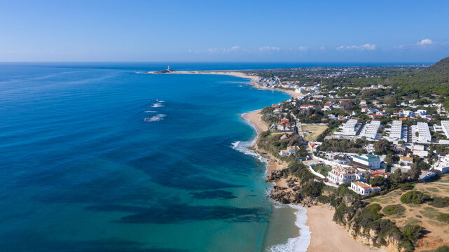 Aerial perspectives of a south Spanish beach in Andalusia with turquoise blue water. Andalusian Atlantic beach background. Ocean in Ca&ntilde;os de Meca, C&aacute;diz, Andalusia, Spain.