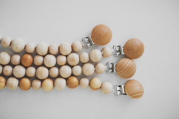 Fragment of wooden beads. Top view package