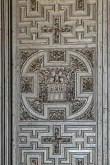 A fragment of a relief door to the Mosque-Cathedral of Cordoba (Mezquita-Catedral de Cordoba), also known as Great Mosque (from 785), monuments of Moorish architecture. Andalusia, Cordoba, Spain.