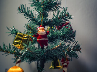 close up of a small Santa doll with Christmas tree on  Christmas festival