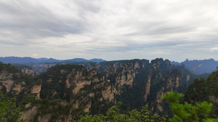 Fototapeta premium The sandstone pillars. Mountains in the national park Wulingyuan. Zhangjiajie. UNESCO World Heritage Site. China. Asia