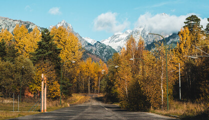Naklejka premium Panoramic shot of autumn mountain landscape during sunset. High Tatras, Slovakia, seen from Poprad