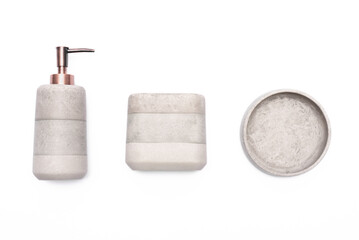 Liquid soap dispenser, teethbrush holder and soap plate isolated on the white background top view.