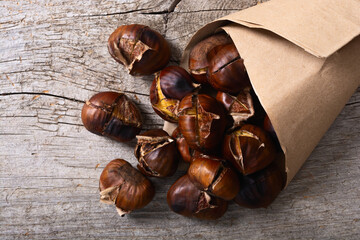 Tasty fried chestnut snack background