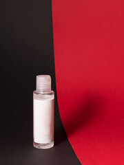 White tube bottle of shampoo, conditioner, hair rinse, mouthwash, on a colored background.