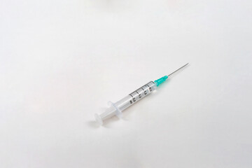 syringe and needle isolated on white background