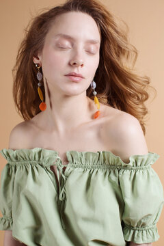 Portrait of a beautiful woman with ginger hair.
