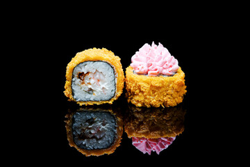 Breaded sushi with delicious sauce. Photos for the restaurant menu.