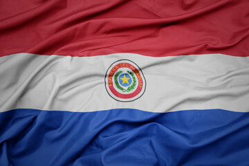 waving colorful national flag of paraguay. © luzitanija