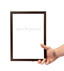 Wooden frame in a man's hand on a white isolated background.