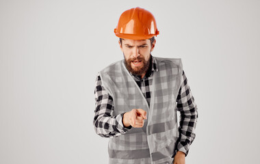 man in working uniform orange helmet construction work
