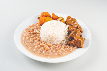 Brazillian Deli Food plate with rice, beans, vegetables and beef