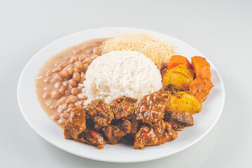 Brazillian Deli Food plate with rice, beans, vegetables and beef