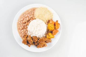 Brazillian Deli Food plate with rice, beans, vegetables and beef
