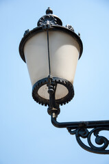 Fototapeta na wymiar Black iron street lantern