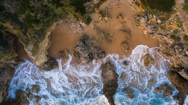 Aerial view of the sand beach of Ca&ntilde;os de Meca with blue water. Top view, amazing natural beach background. Atlantic Ocean in Ca&ntilde;os de Meca, C&aacute;diz, Andalusia, Spain.