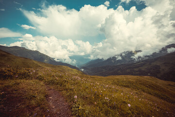 Beautiful mountain landscape with clouds at Caucasus mountains