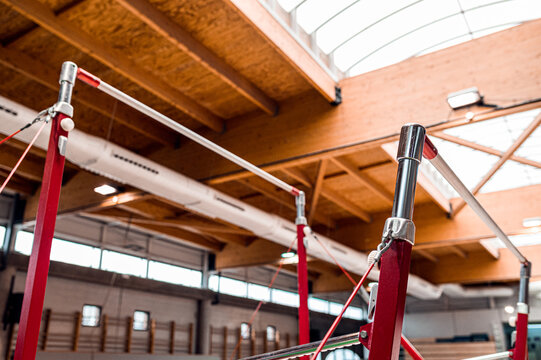 uneven bars for exercise parallels in a modern Gym for artistic gymnastic