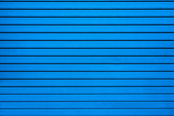 Blue wall with straight stripes