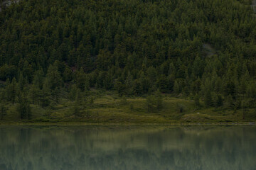 mirror surface of high mountain lake Akkem