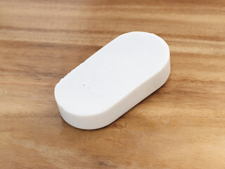 Brick of a surf wax for surfboard.